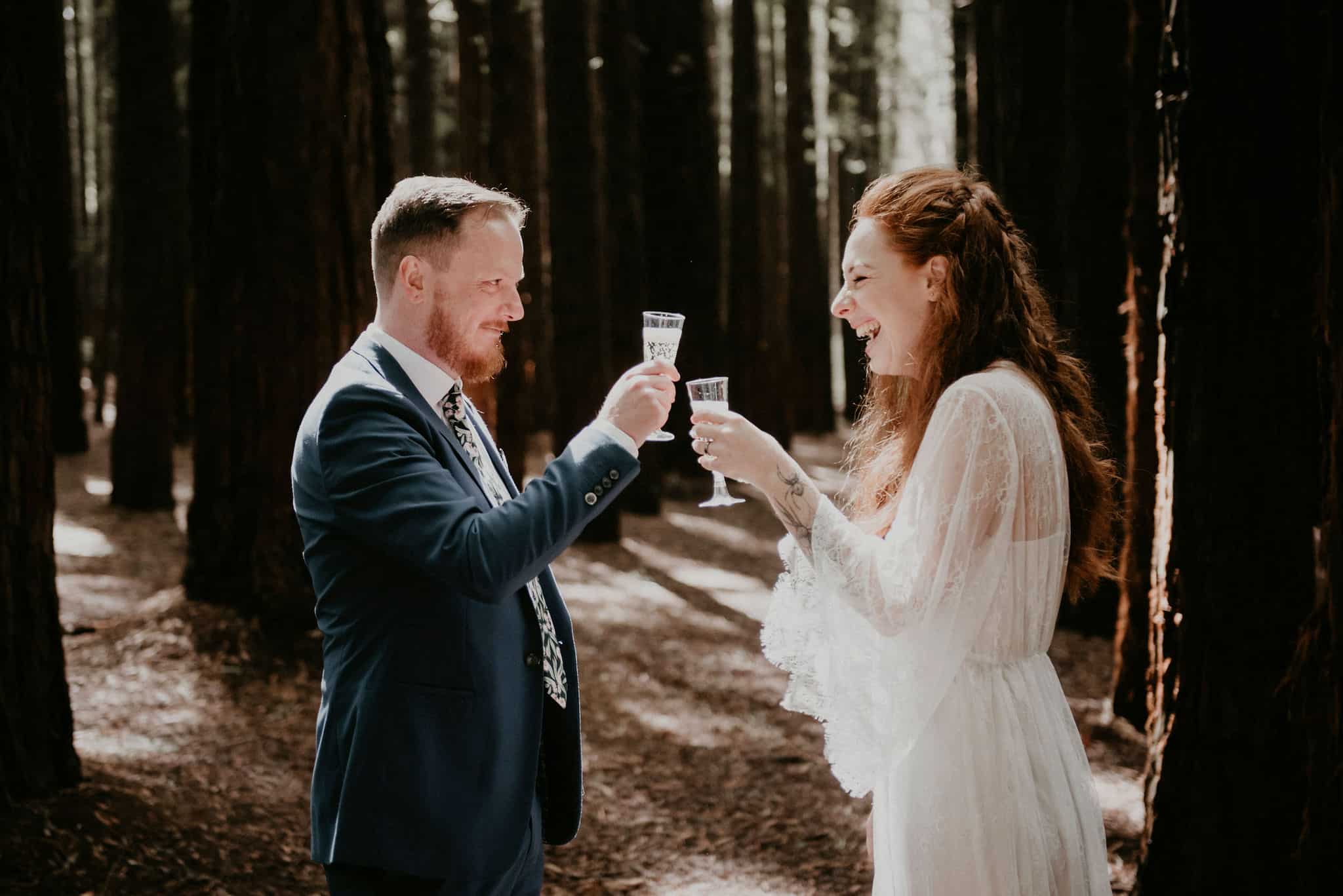 Couple toast to their marriage amongst the trees in the dappled light Let's Elope Melbourne Celebrant Photographer Elopement Package Victoria Sarah Matler Photography Warburton Redwood Forest Yarra Valley intimate wedding Ceremony